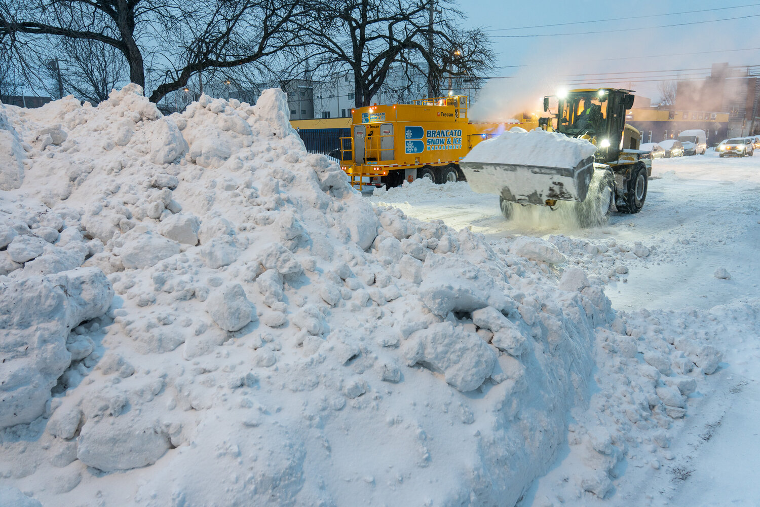 City crews remove snow from the road following the Jan. 25, 2026, storm.