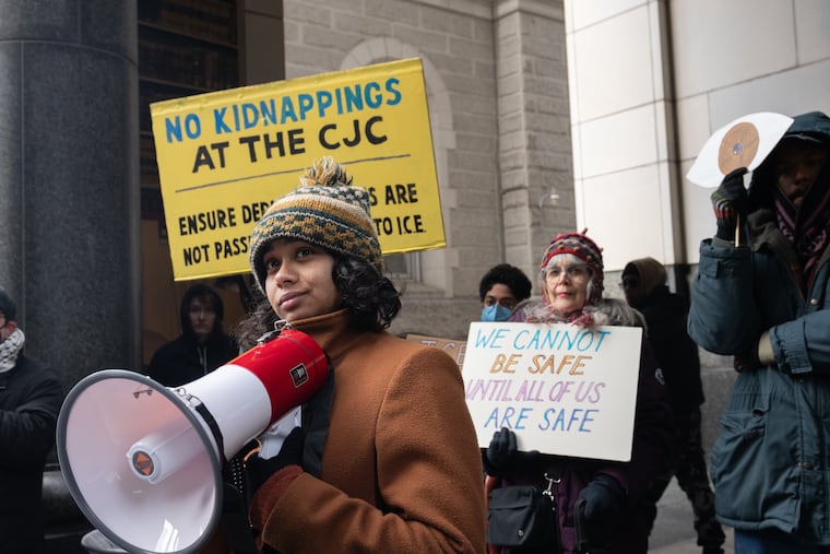 Aniqa Raihan, an organizer with No ICE Philly, speaks at a December protest at the Criminal Justice Center. She and others had invited Sheriff Rochelle Bilal to speak, though the sheriff did not attend.