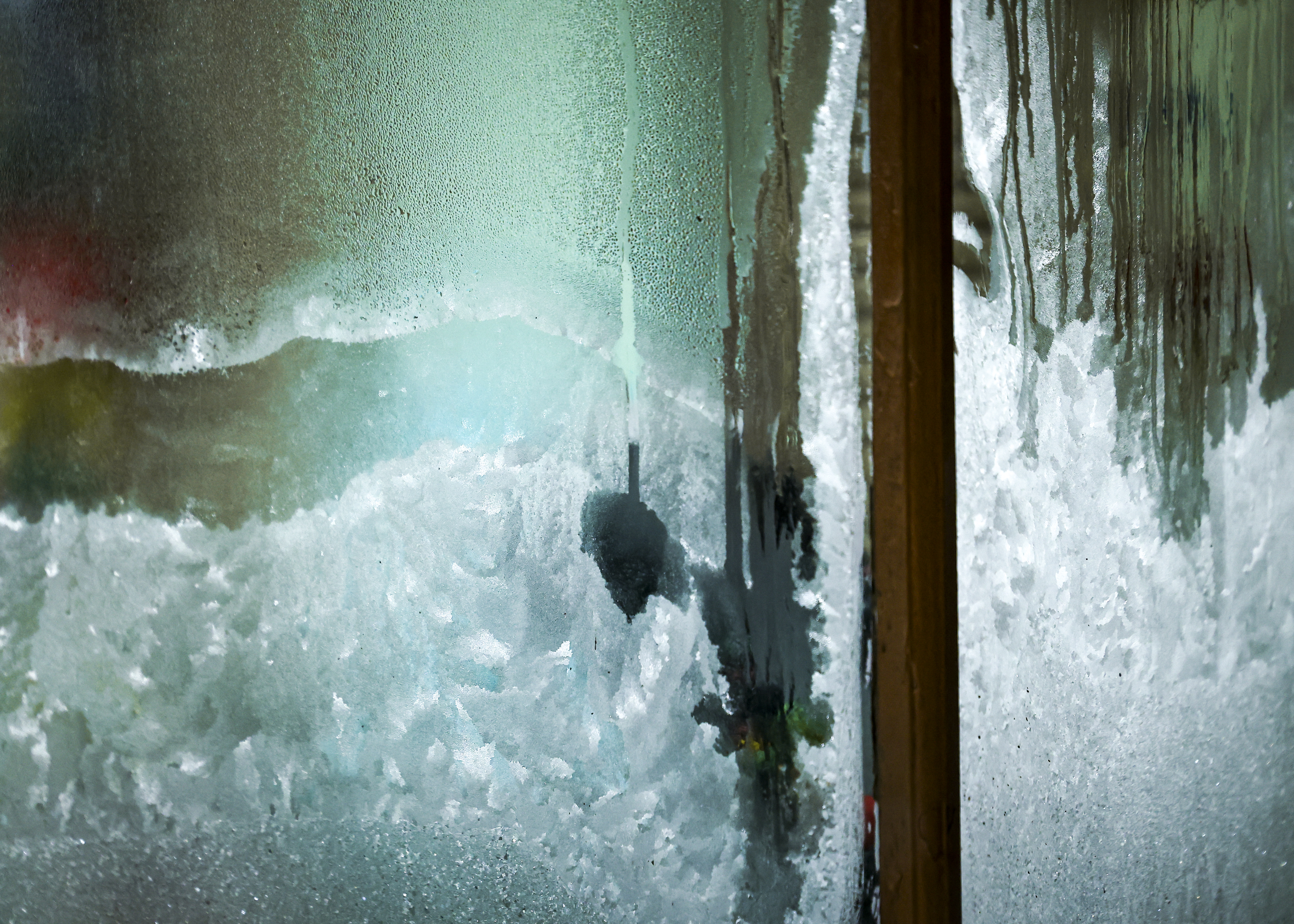 Ice forms on the inside of the windows of Jois Boutique around 6:55 a.m. in Easton Sunday, Jan 25, 2026.