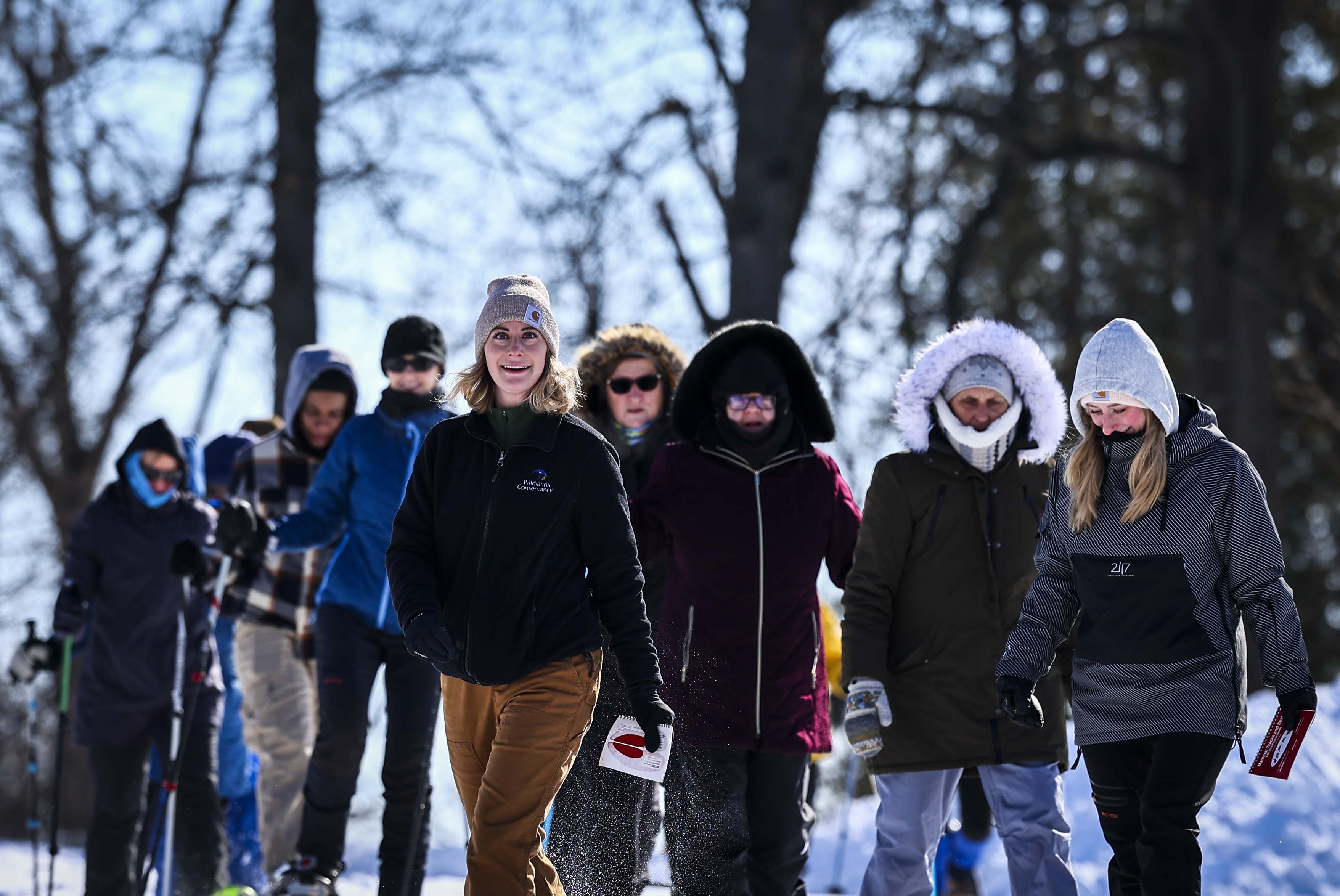 Nicole Landis, Senior Community Engagement Specialist with Wildlands Conservancy, left, eads a Winter Wildlife Snowshoe excursion Wednesday, Jan. 28, 2026, through Janet Johnston Housenick and William D. Housenick Memorial Park and Archibald Johnston Conservation Area in Bethlehem Township.