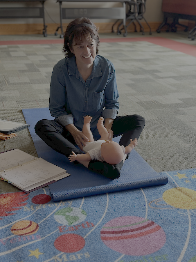 Infant massage classes, like this, are available at Achievement Center of LECOM Health in Erie PA