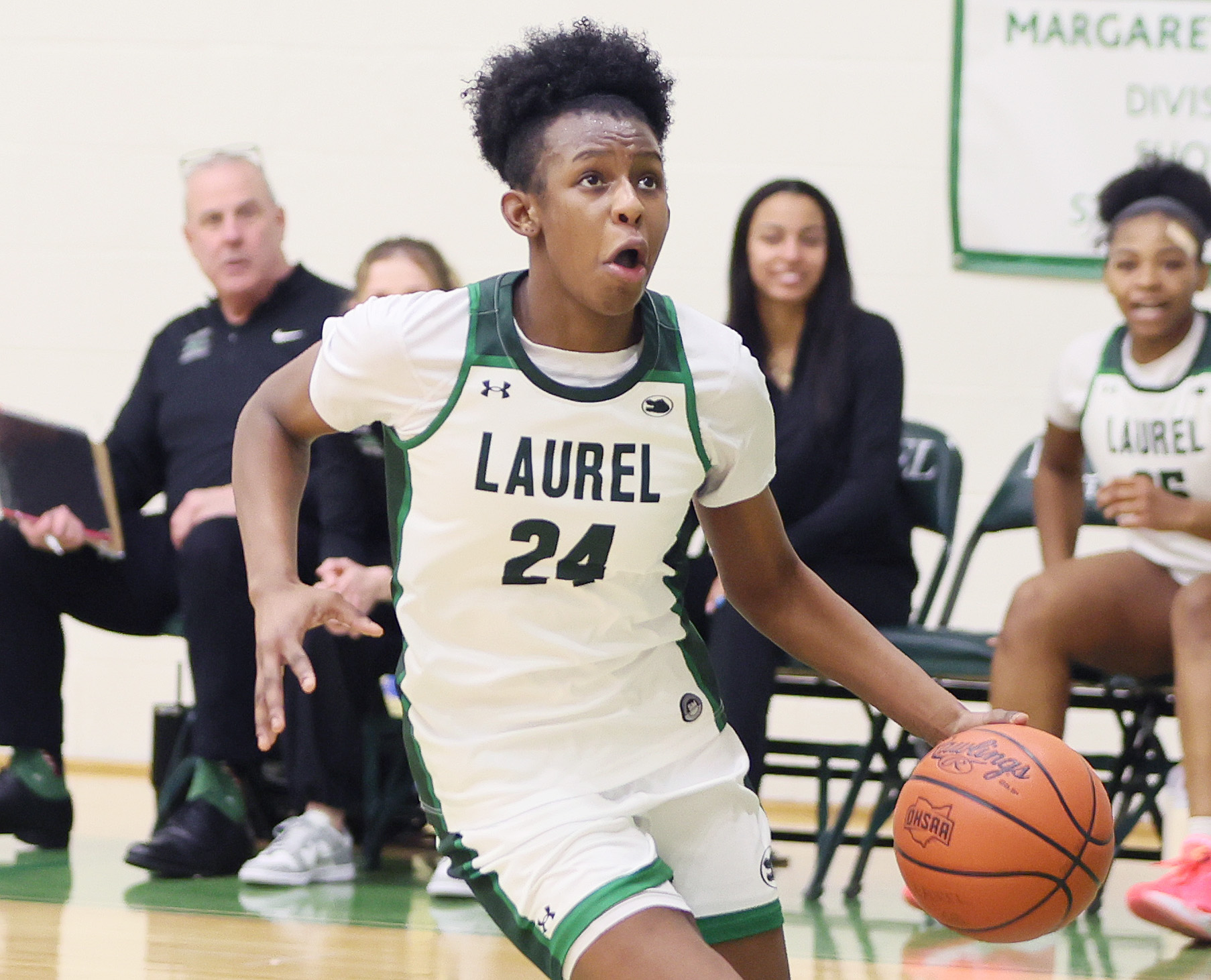 Laurel's Tristan Williams brings the basketball down court in the second half against Cathedral Prep.