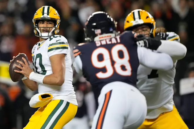 CHICAGO, ILLINOIS - DECEMBER 20: Jordan Love #10 of the Green Bay Packers looks to pass against the Chicago Bears during the first quarter at Soldier Field on December 20, 2025 in Chicago, Illinois. (Photo by Patrick McDermott/Getty Images)