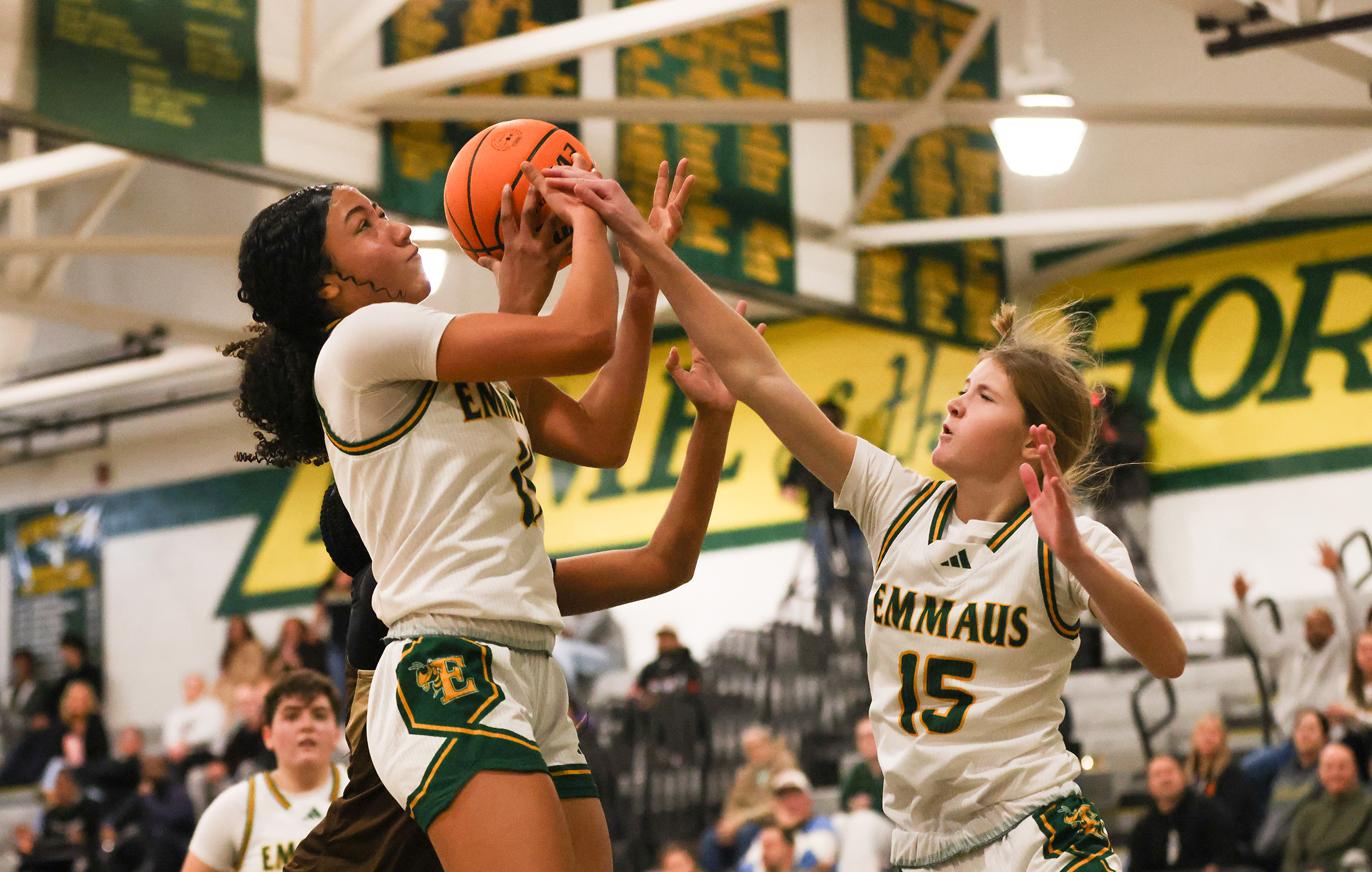 Emmaus player Gracie Ervin (11) tries to get the ball in the basket during a game against Bethlehem Catholic on Jan. 12, 2026
