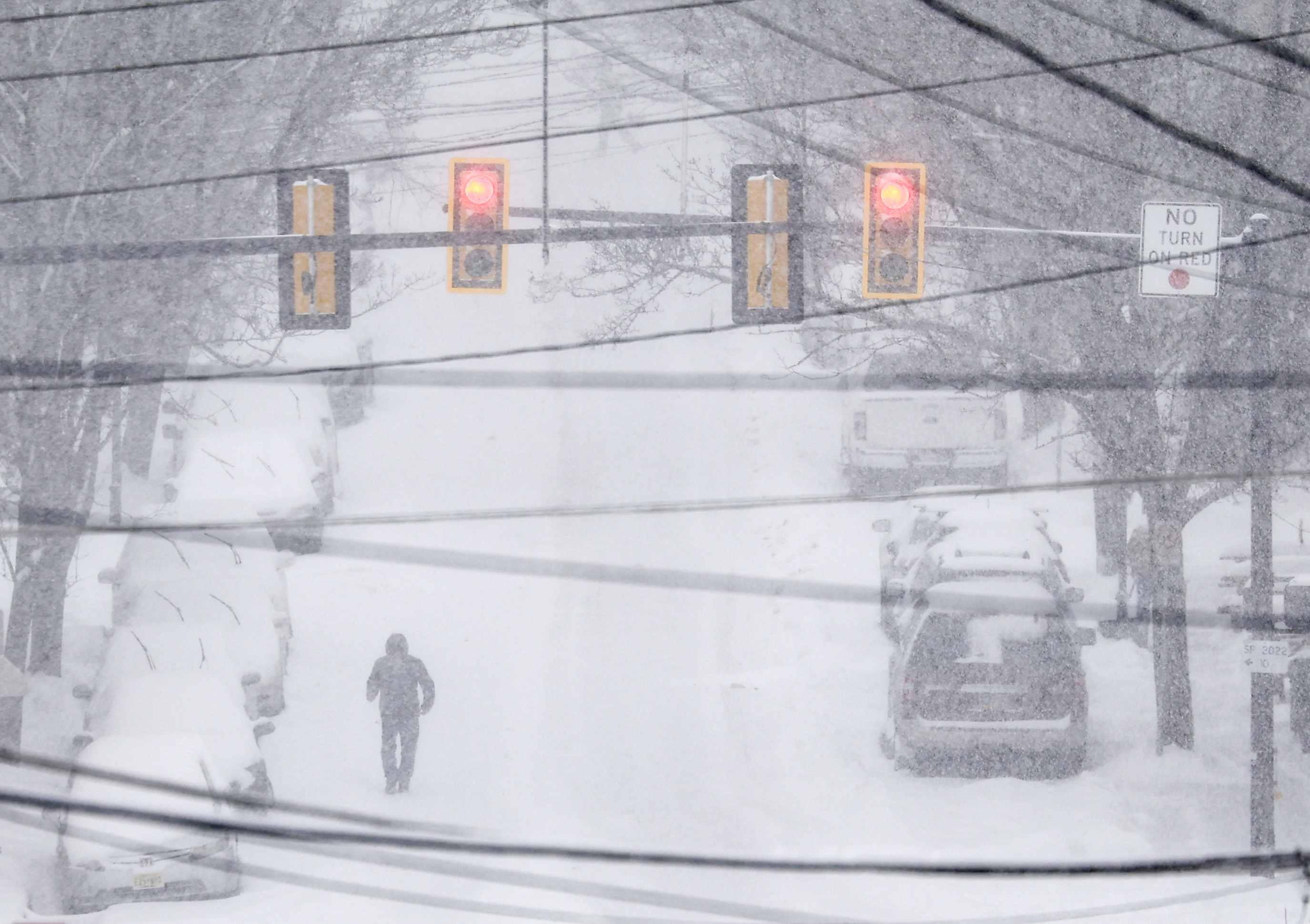A pedestrian walks through the snow on S. 7th Street in Easton on Sunday, Jan. 25, 2026.