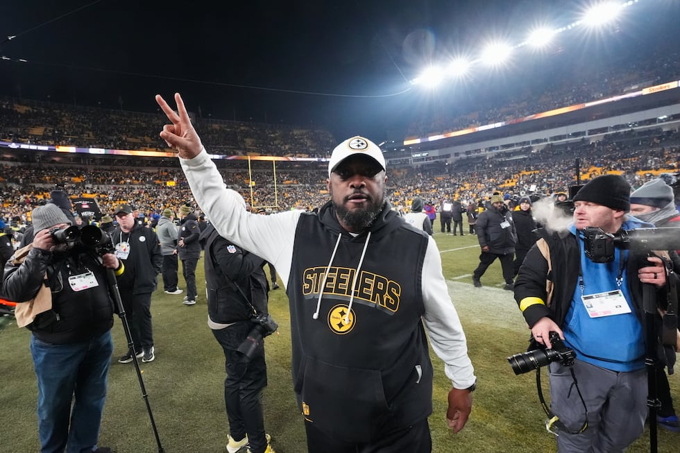 Pittsburgh Steelers head coach Mike Tomlin walks off the field after an NFL football game...