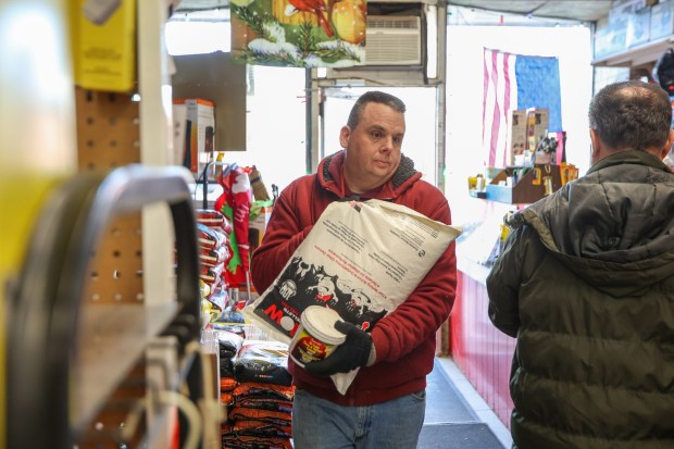 Jim Lehman of Hanover Twp. purchases rock salt in preparation for Sunday's storm at Main Hardware on Saturday, Jan. 24, 2026. (JASON ARDAN / STAFF PHOTOGRAPHER)
