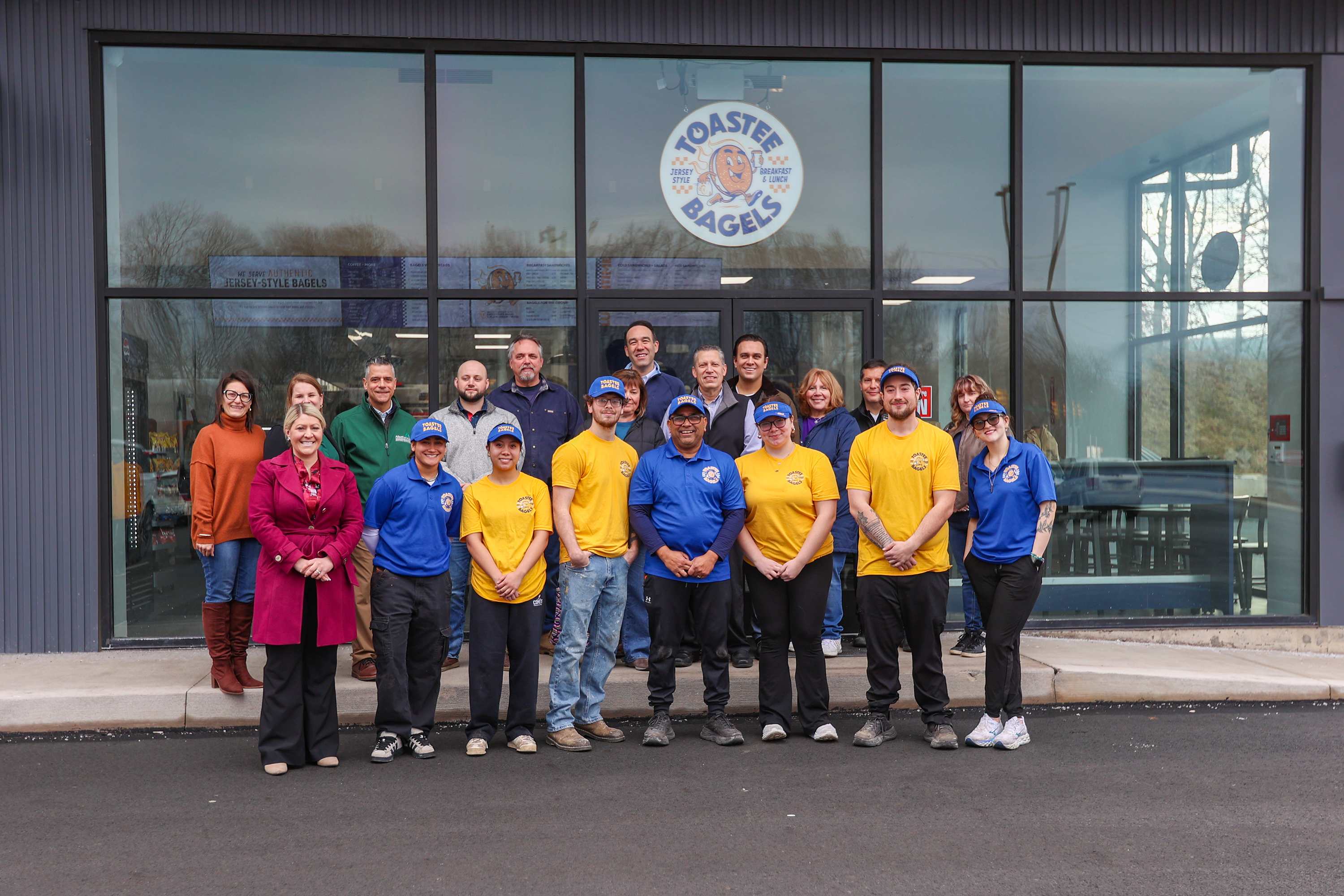 Employees of Toastee Bagels and other attendees during Toastee Bagels’...