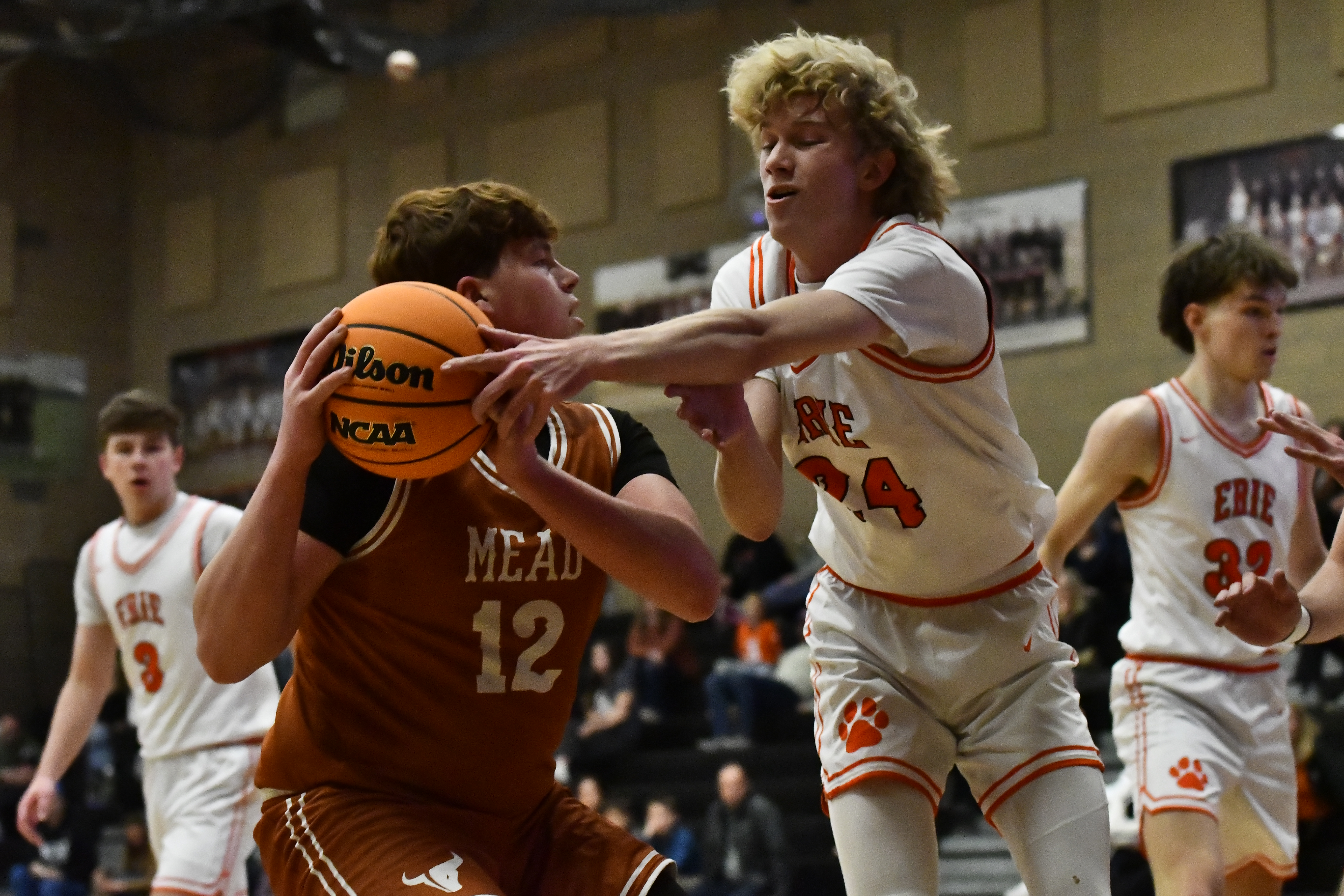 Mead's Jack Rogowski looks to take a shot with pressure...