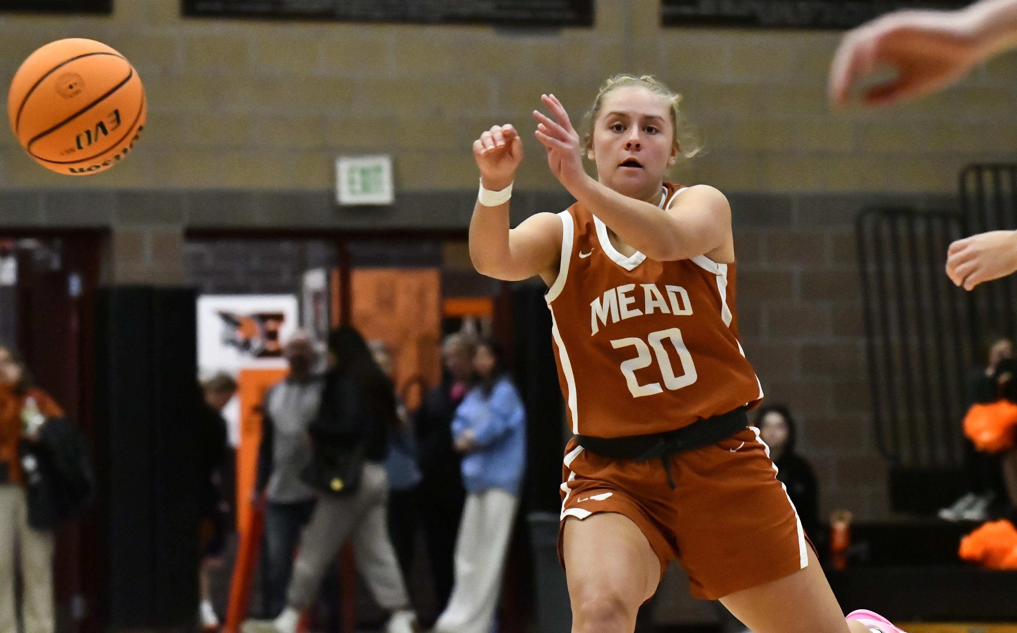 Mead's Emmy Tecu makes a pass during Mead's road game...