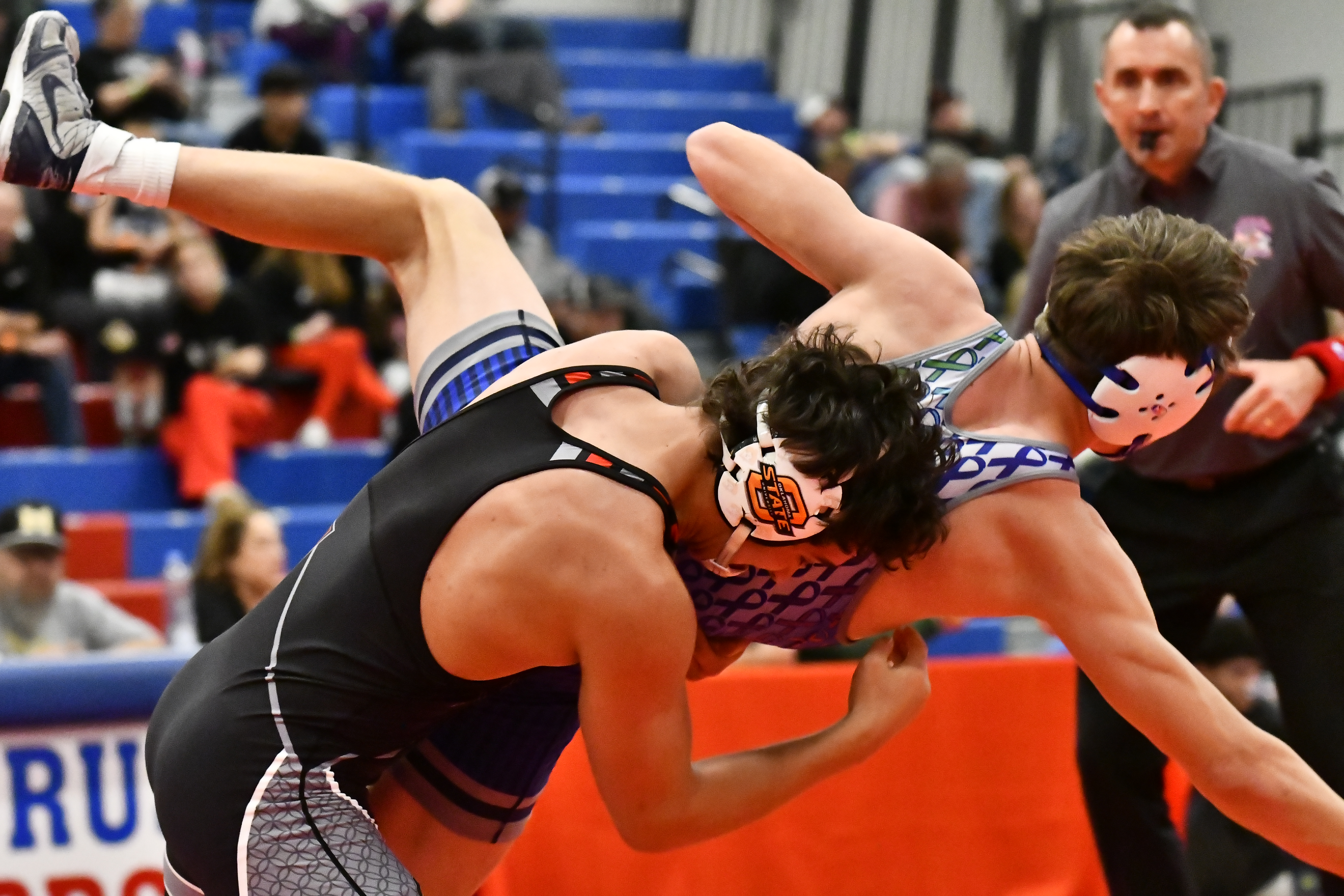 Broomfield's Nick Penfold wrestles against Pomona's Donovan Symalla during the...