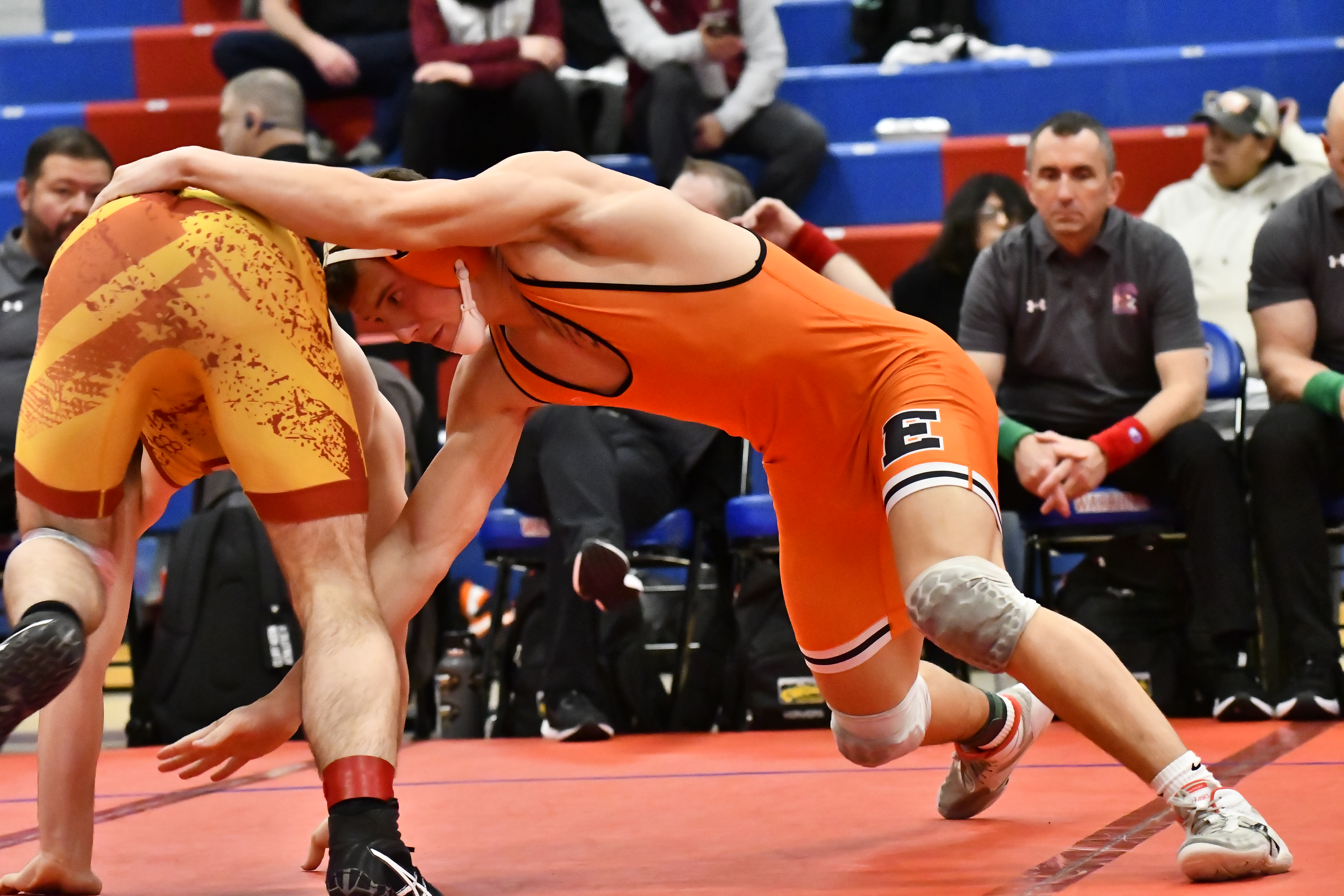 Erie's Tyler Muir wrestles against Brush's Austin Ley during the...