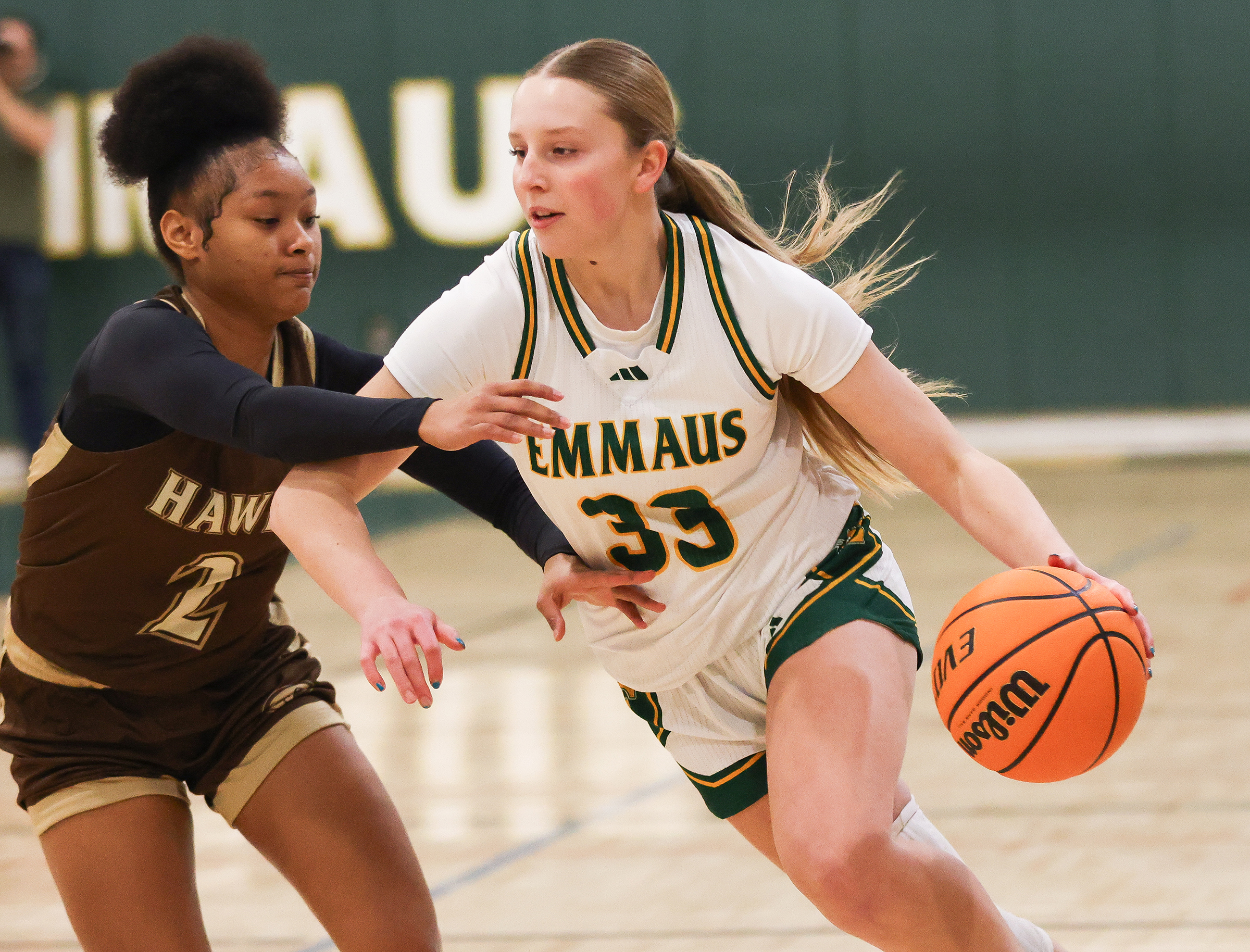 Bethlehem Catholic's Avaughna Gordan (2) defends Emmaus player Sierra Stevens (33) during game at Emmaus on Jan. 12, 2026.