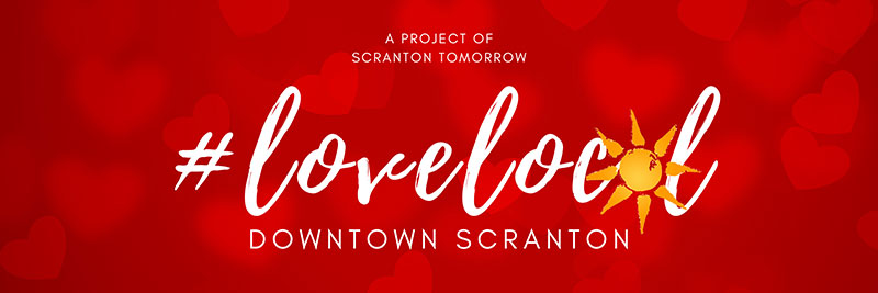 A red banner graphic depicting Scranton Tomorrow’s #lovelocal campaign.