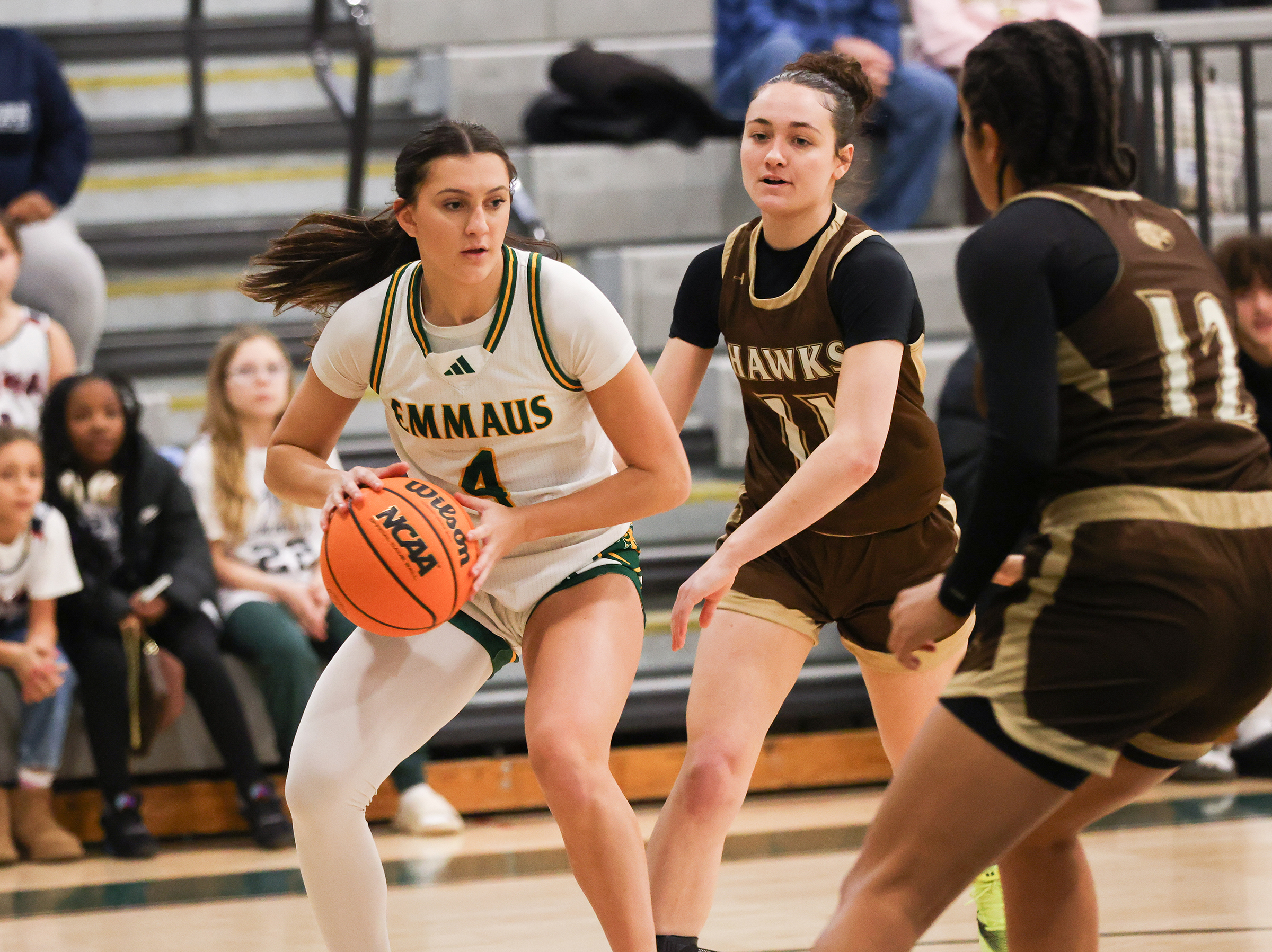 Bethlehem Catholic's Leah Ault (11) defends Emmaus player Gabby DeVita (4) during a game against Bethlehem Catholic on Jan. 12, 2026