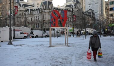 An early morning snow squall left a dusting in LOVE Park before the start of the Mummers Parade on Jan. 1.