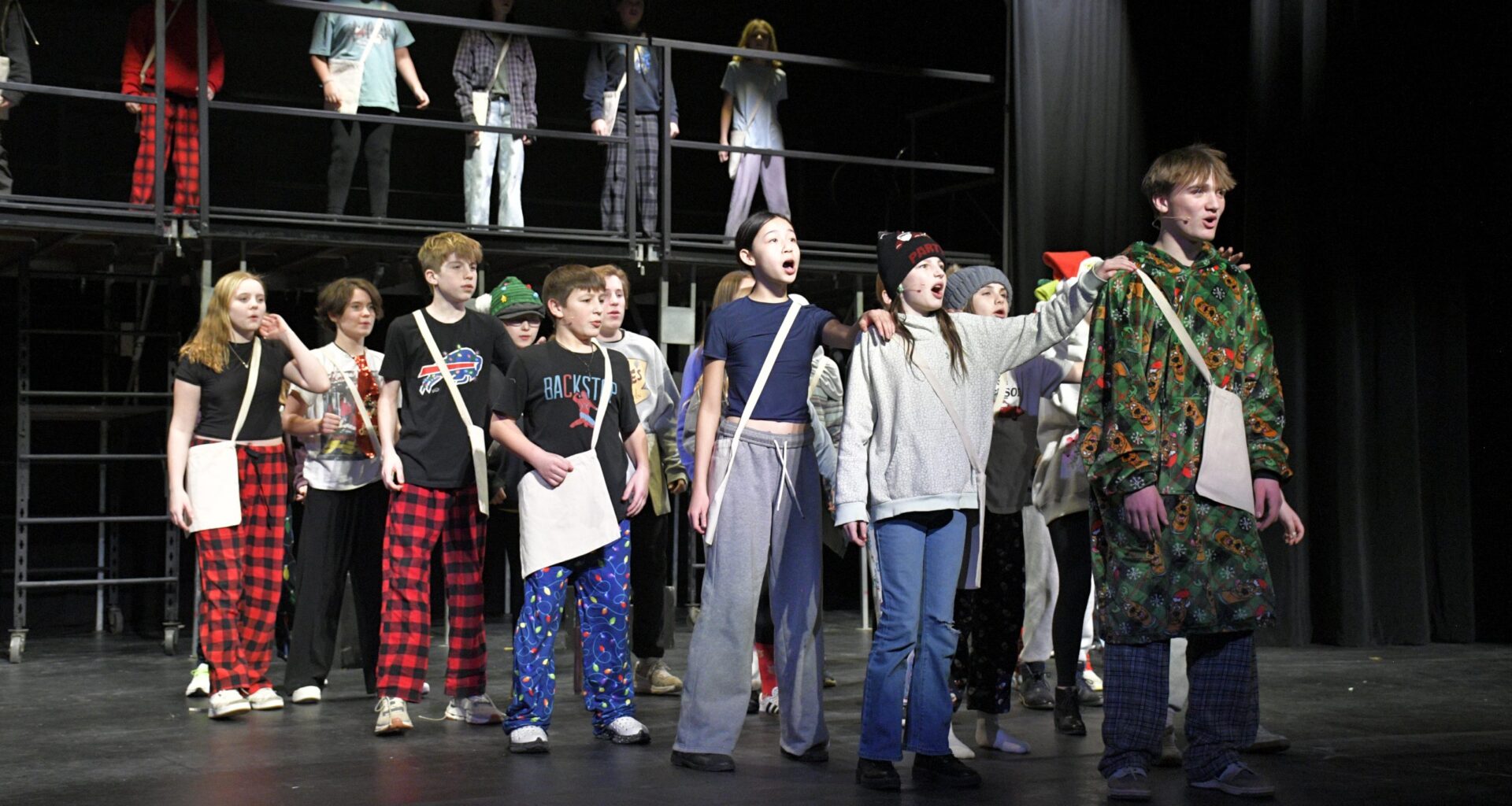 students perform onstage