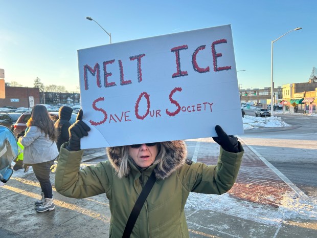 When asked what brought her to the anti-ICE enforcement protest Friday afternoon in such cold weather, Esther Coletta of Havertown says, "How could I stay inside?" (PETE BANNAN-DAILY TIMES)