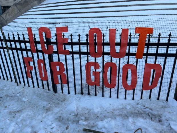Protestors turned out Friday evening in front of Upper Darby Township building to protest ICE and call for more support for community needs. (PETE BANNAN-DAILY TIMES)