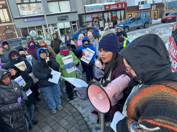 Gabriela Caspandea from the Movement of Immigrant Leaders in Pennsylvania speaks at Friday's protest. (PETE BANNAN-DAILY TIMES)