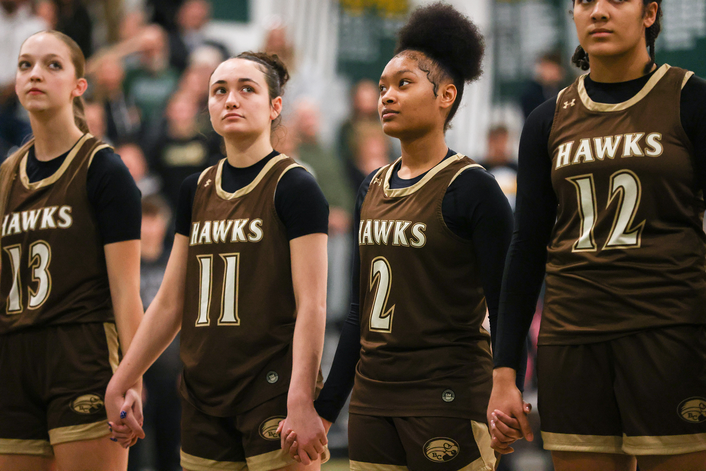 Bethlehem Catholic girls basketball team holds hands before the start of the game at Emmaus on Jan. 12, 2026.