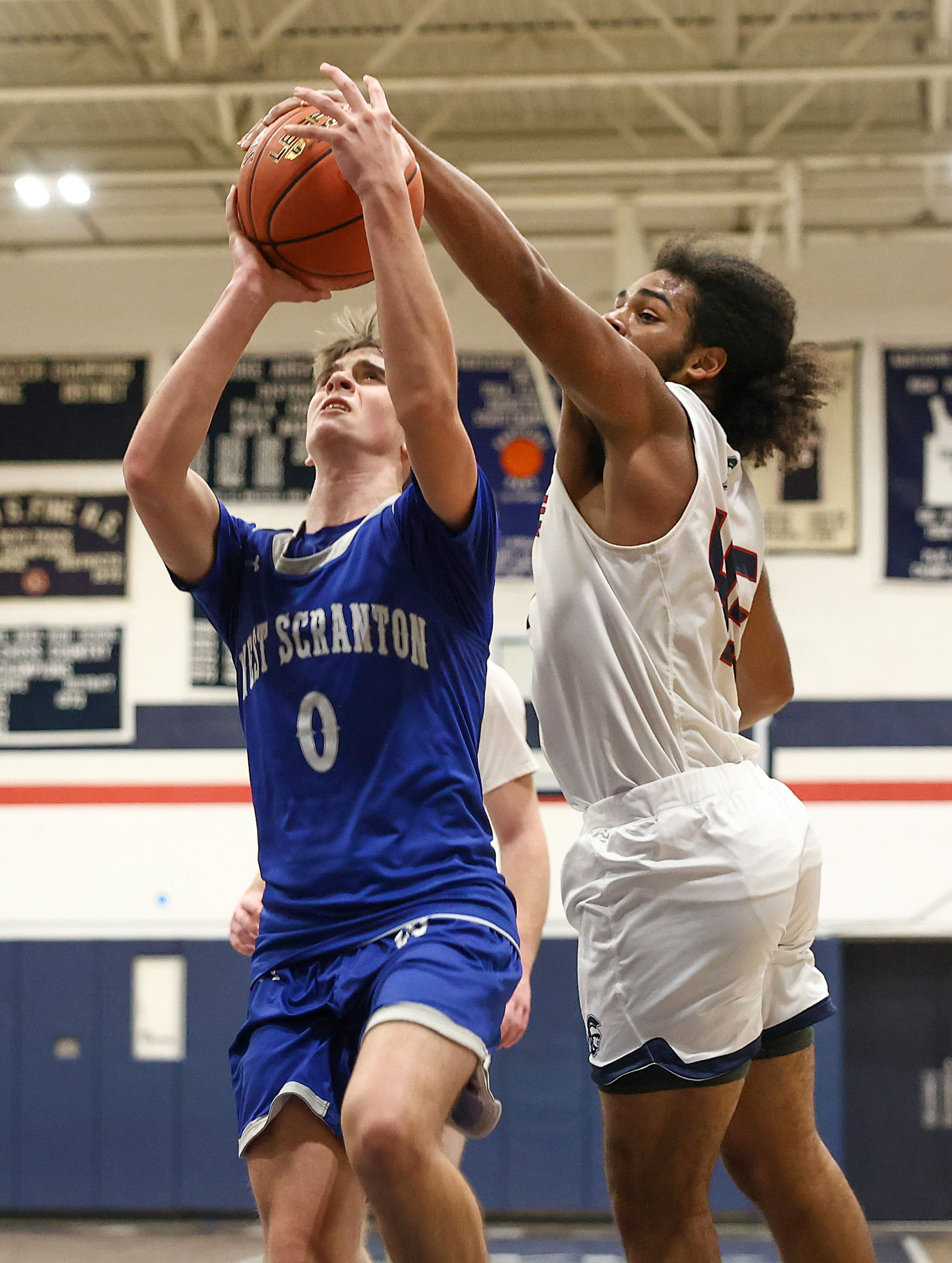 Nanticoke Areaâs Mathias Mitchell (45) block a shot on West...