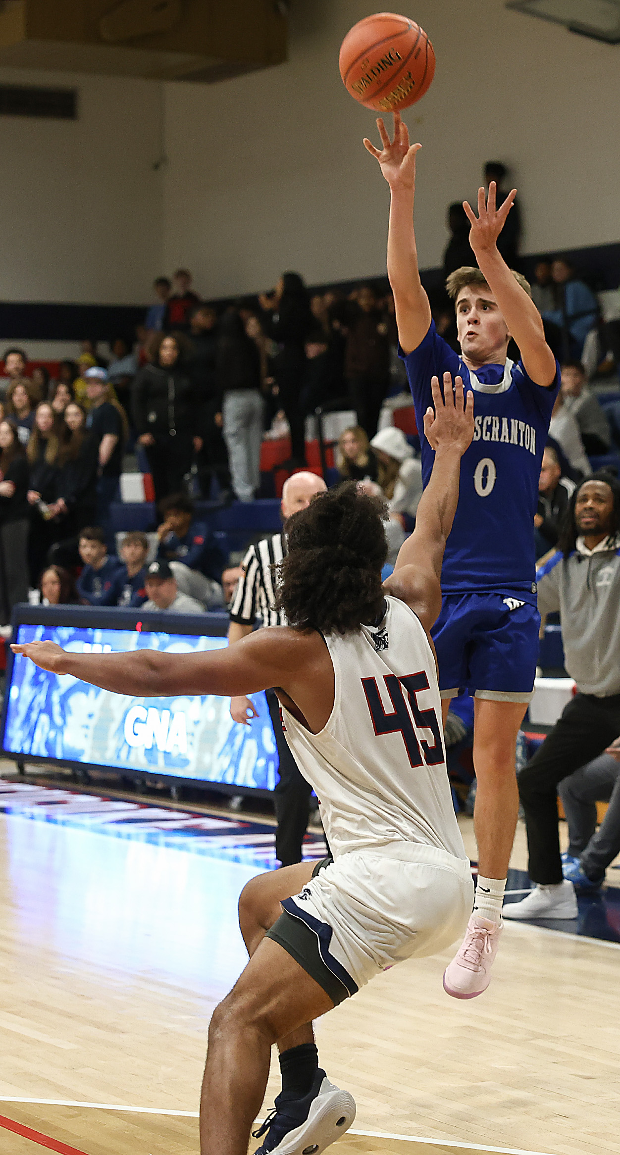 West Scrantonâs Nate Schimelfenig (0) shoots a three pointer over...