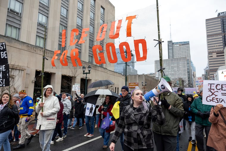 Lauren Steinmeyer, with Indivisible Philadelphia, leads chants during the march in protest against ICE in Philadelphia, Pa., on Saturday, Jan. 10, 2026.