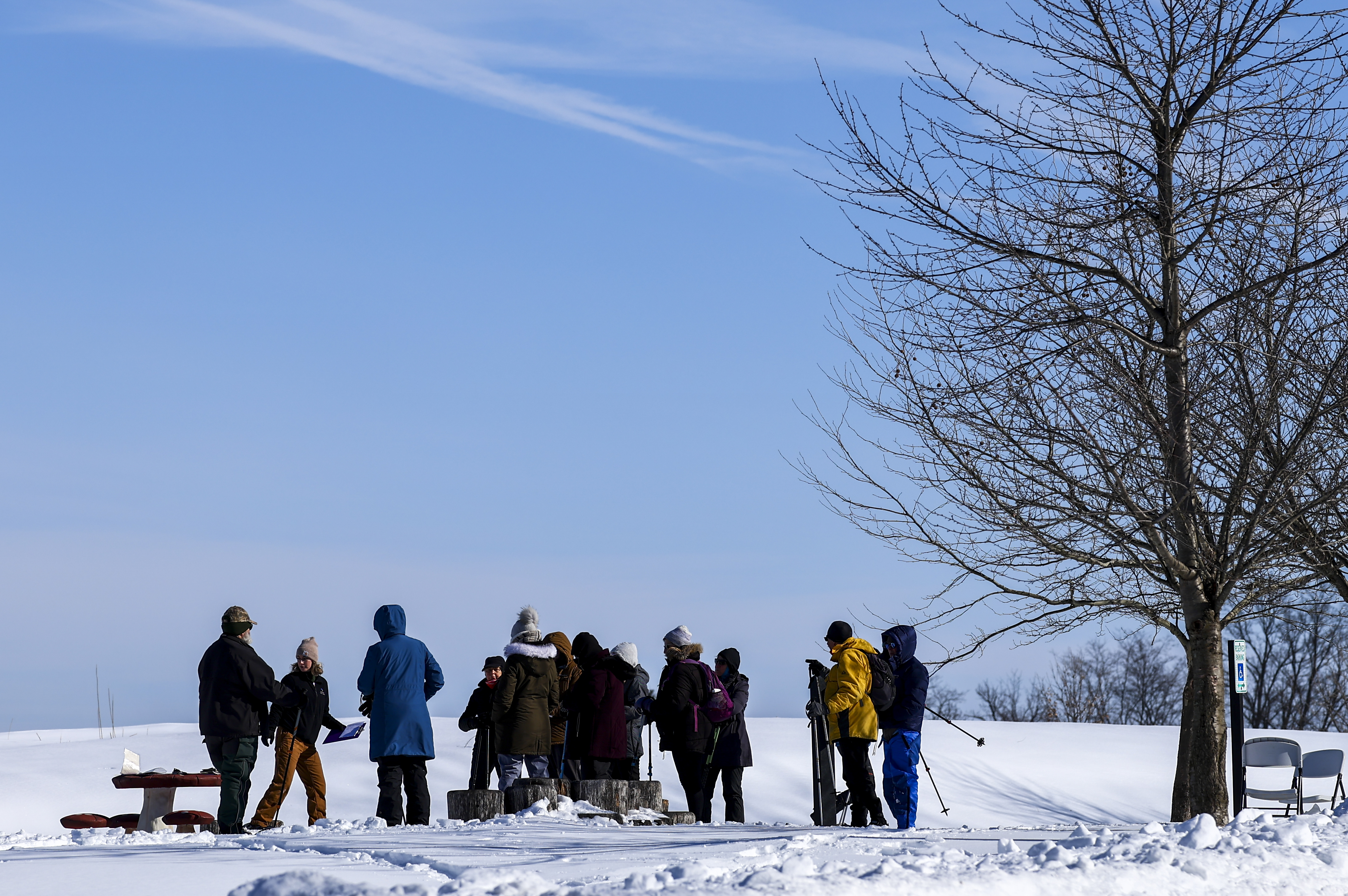 Nicole Landis, Senior Community Engagement Specialist with Wildlands Conservancy, briefs a small group before leading a Winter Wildlife Snowshoe excursion Wednesday, Jan. 28, 2026, through Janet Johnston Housenick and William D. Housenick Memorial Park and Archibald Johnston Conservation Area in Bethlehem Township.