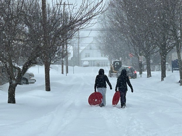 S stands for snow and saucers in Haverford Township and many spots across the area. (PETE BANNAN - DAILY TIMES)