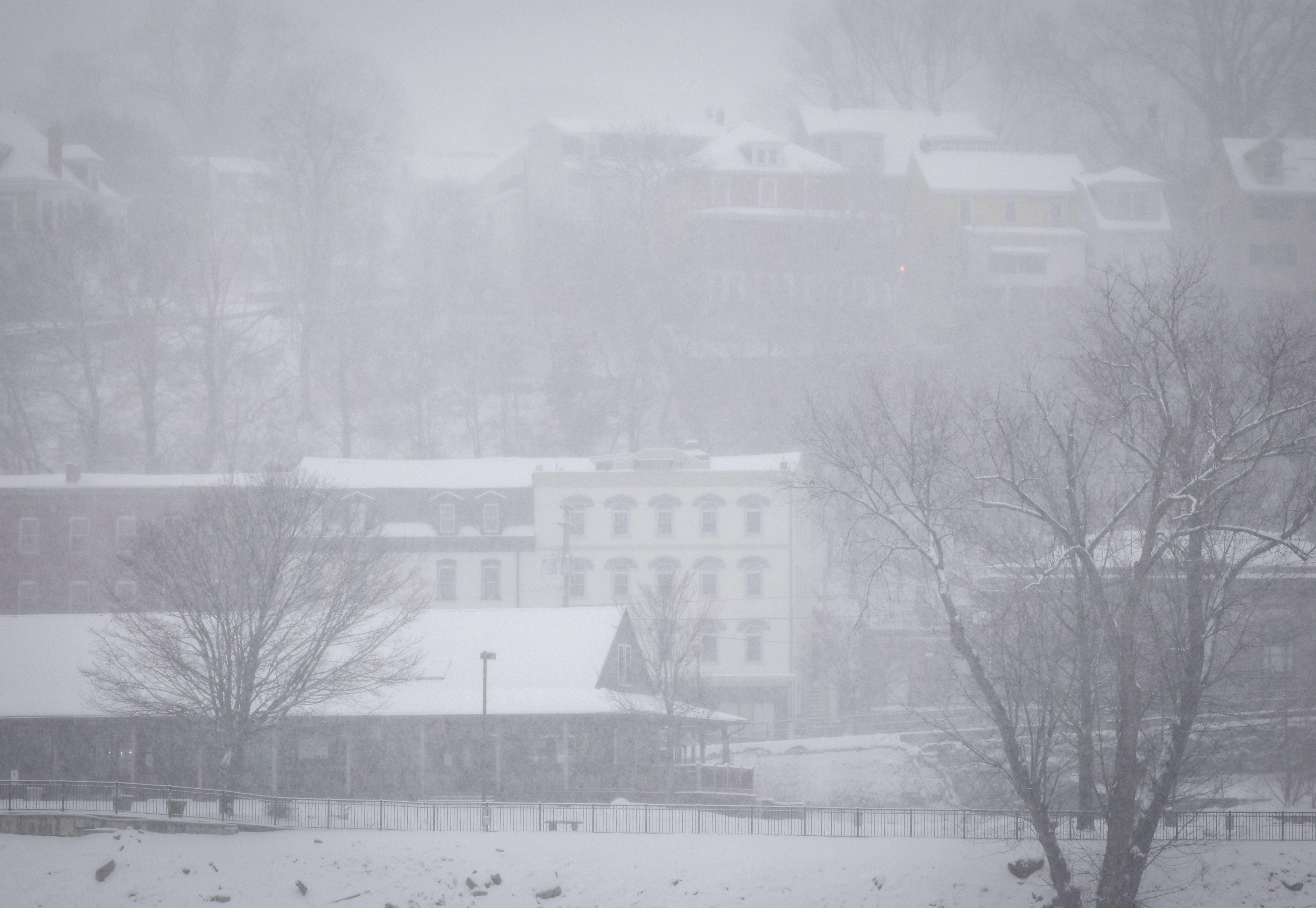 Heavy snow reduces visibility as Phillipsburg are seen from Easton on Sunday, Jan. 25, 2026.