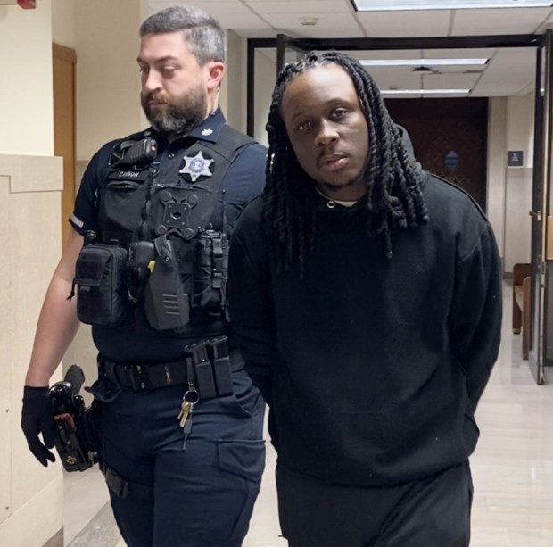 Jamal McCullough is escorted from a Montgomery County courtroom by a deputy sheriff to begin prison term for fatal hit-and-run crash. (Photo by Carl Hessler Jr. - MediaNews Group)