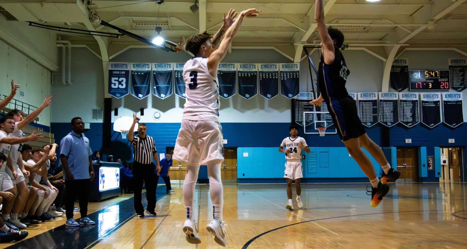 North Penn senior Chris Kingkiner knocks down a corner three, one of many the Knights hit in their 49-40 win over Bensalem.