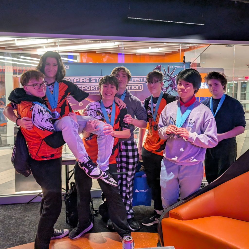 students celebrating medal wins