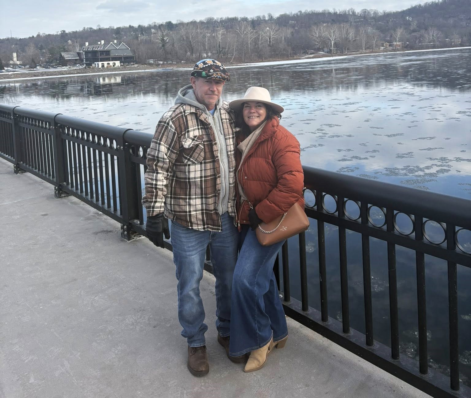 Gina and Joe Burns nestled together on the Delaware in...