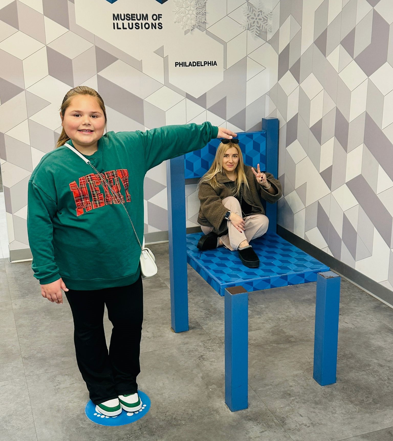 Olivia Dudley dwarfs mom Sofia in a mind bending shot...