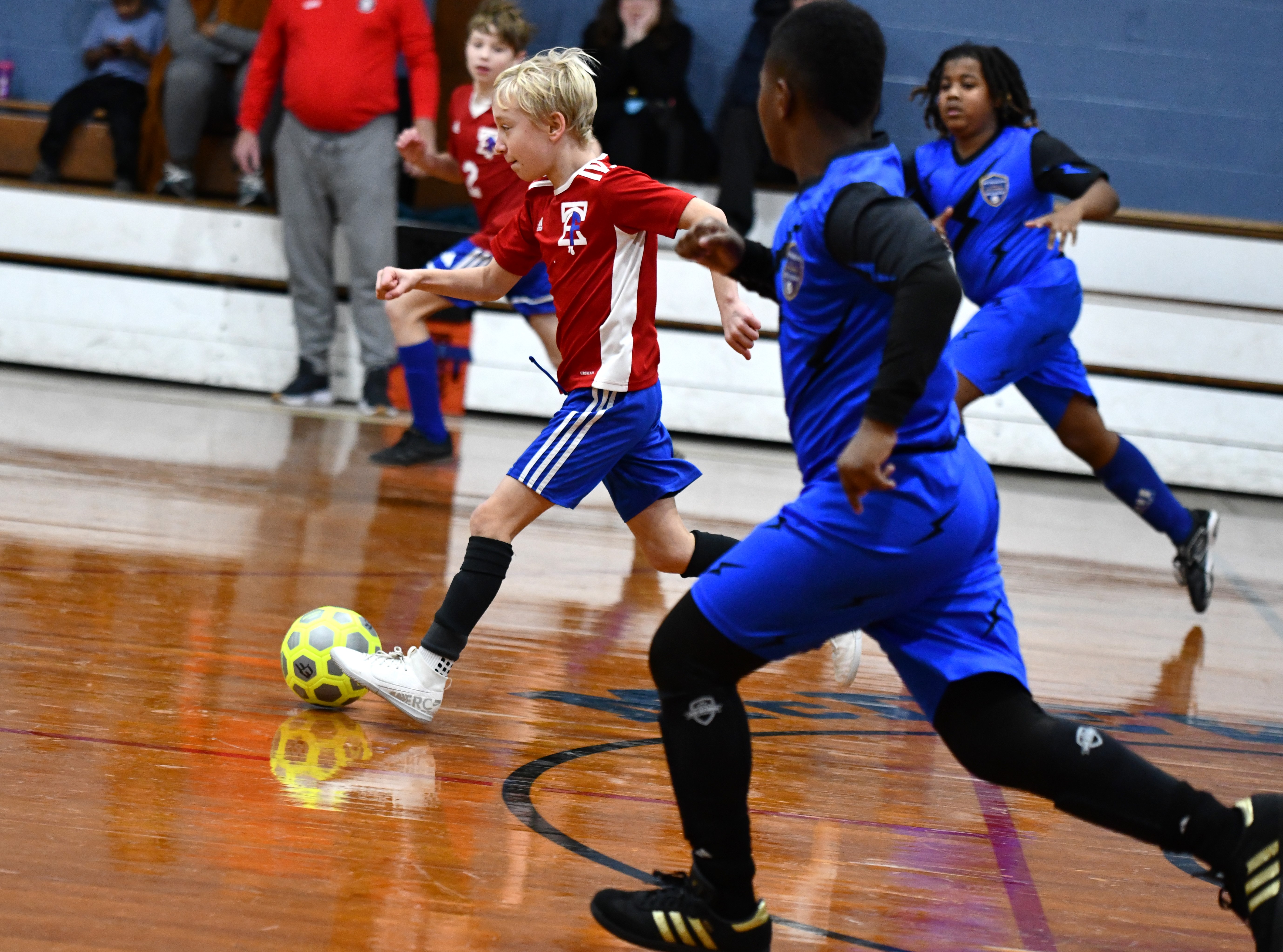 East Falls Izzak Baylson streaks toward the West Philly goal....