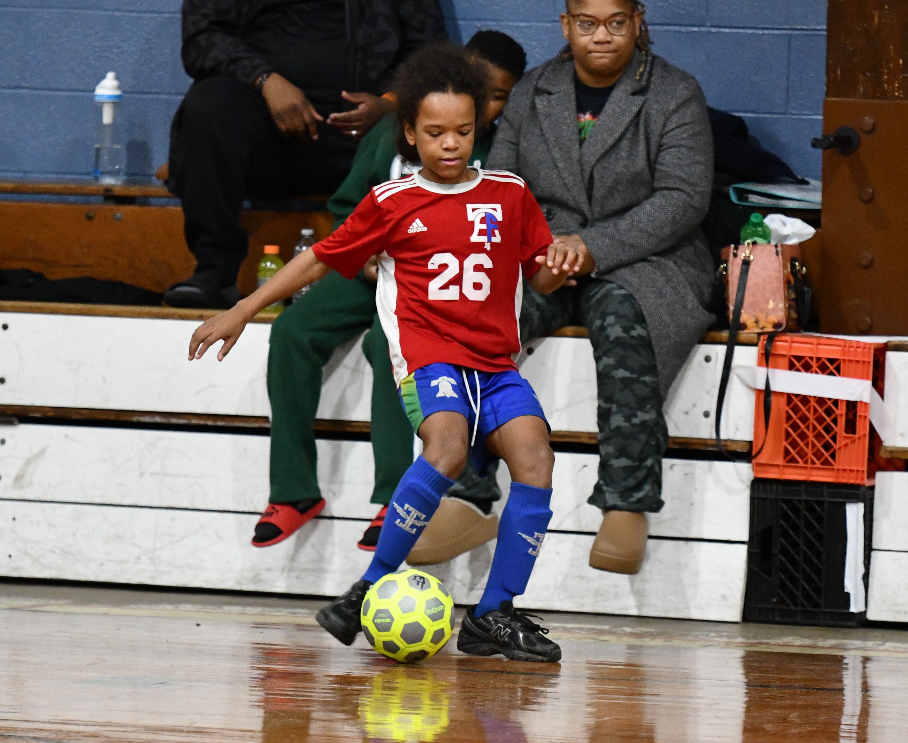 East Falls Mu Drayton pushes the ball in from the...