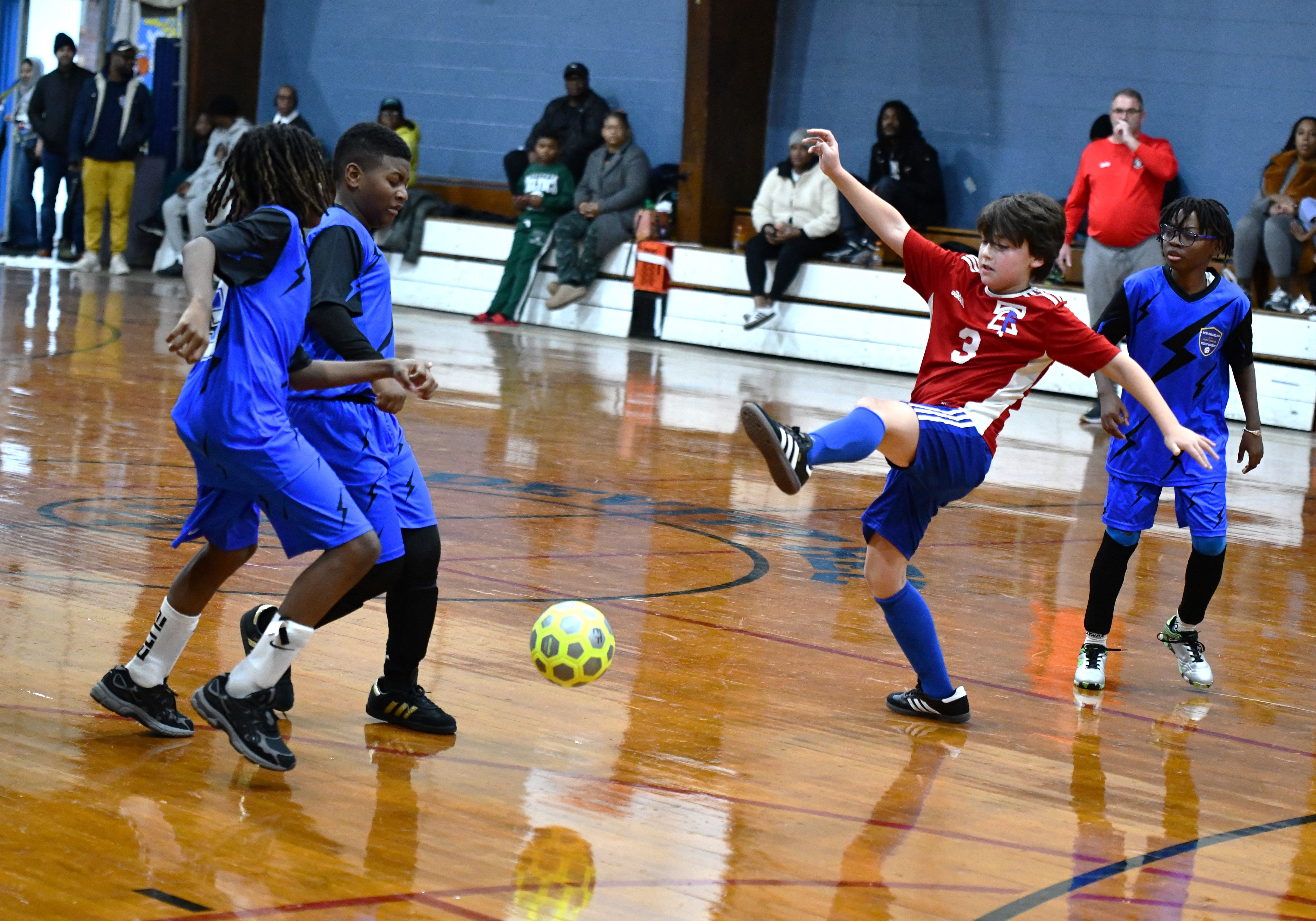 East Falls Charlie Stein breaks up a West Philly advance....