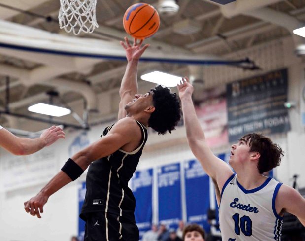 Berks Catholic's Kingston McKoy lays in two of his game-high 22 points against Exeter in a 64-50 Saints victory over the Eagles on Thursday, Jan. 8, 2026, at Exeter. (BILL UHRICH/READING EAGLE)