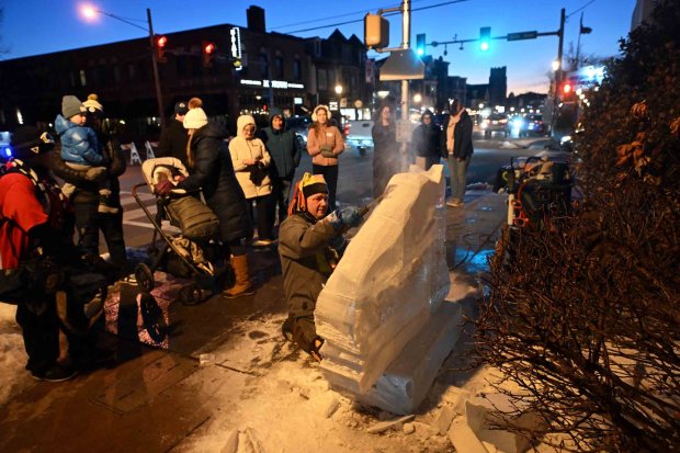 Danny Kissel of Shippensburg carves a Nittany Lion at the corner of Penn and Sixth avenues at the Ice and Spice Festival in West Reading on Friday, Jan. 23, 2026. Kissel will have carved 53 blocks of ice for the festival. (BILL UHRICH/READING EAGLE)