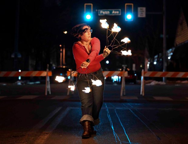 Azula Murdra of Reading performs a fire dance at the Ice and Spice Festival in West Reading on Friday, Jan. 23, 2026. (BILL UHRICH/READING EAGLE)