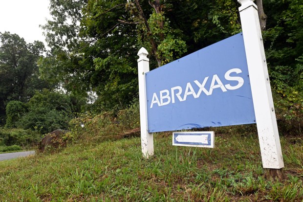A sign off of Route 10 in New Morgan points the way to Abraxas Academy in New Morgan. (BILL UHRICH - READING EAGLE)