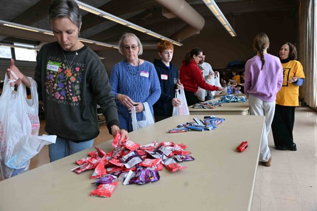 Volunteers pack lunch bags at Immanuel UCC in Shillington during Martin Luther King Jr. Day of Service event on Monday, Jan. 19, 2026. (BILL UHRICH/READING EAGLE)
