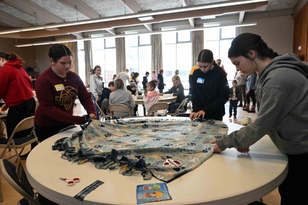 Students make blankets at Immanuel UCC in Shillington during Martin Luther King Jr. Day of Service on Monday, Jan. 19, 2026. (BILL UHRICH/READING EAGLE)