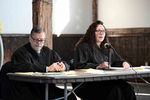 Pennsylvania Public Utility Commission Law Judges Jeffrey A. Watson and Emily DeVoe preside at a PUC hearing about proposed rate changes by the Pennsylvania American Water Company at the Dunn Community Center, 4565 Prestwick Drive, Exeter Township, on Tuesday, Jan. 20, 2026. (BILL UHRICH/READING EAGLE)