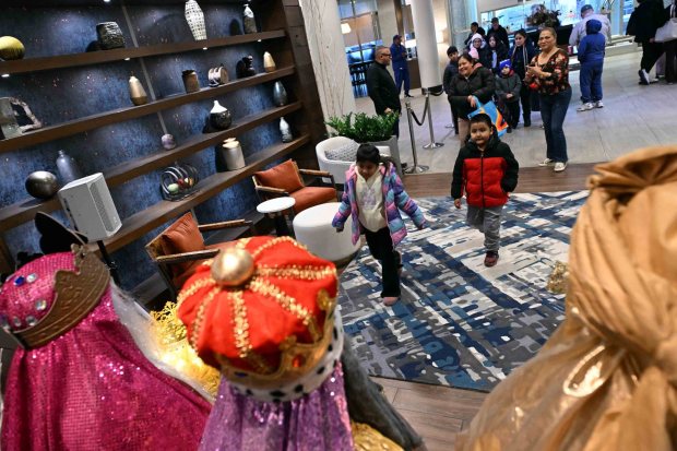 Children greet the Three Kings during the Three Kings Day celebration at the DoubleTree by Hilton hotel, 701 Penn St., on Tuesday, Jan. 6, 2026. (BILL UHRICH/READING EAGLE)