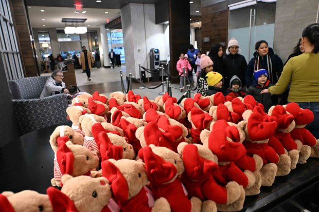 Children prepare to pick a toy during the Three Kings Day celebration at the DoubleTree by Hilton hotel, 701 Penn St., on Tuesday, Jan. 6, 2026. (BILL UHRICH/READING EAGLE)