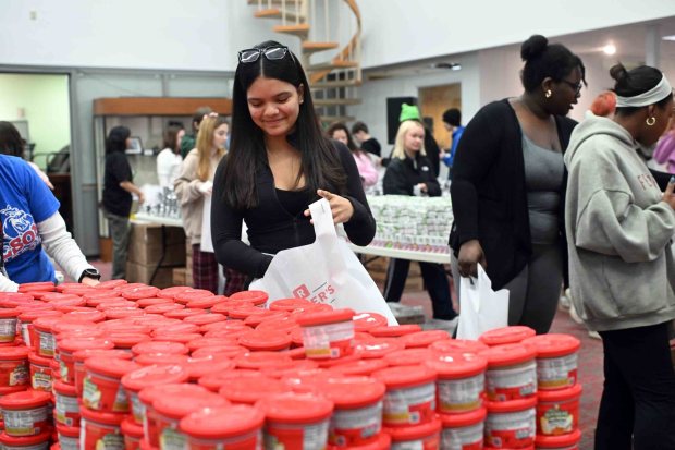 Wilson High School sophomore Karlen Rios, 16, packs a weekend lunch bag during a districtwide day of service on Friday, Jan. 16, 2026. (BILL UHRICH/READING EAGLE)