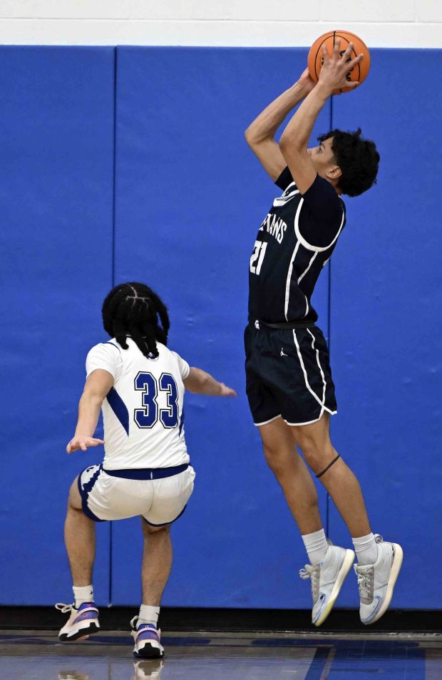 Wyomissing's Daniel Moyer hits the game-winning shot against Oley Valley as time expires in a 71-69 Spartans' double-overtime victory over the Lynx on Friday, Jan. 16, 2026, at Oley.  (Bill UHRICH/READING EAGLE)